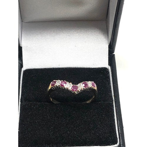 182 - 9ct gold ruby & diamond wishbone ring (2.3g)