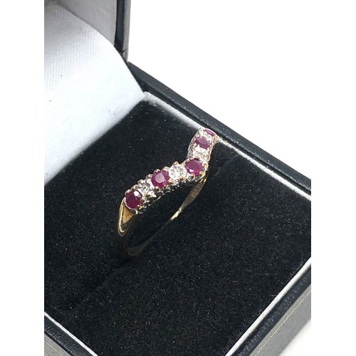 182 - 9ct gold ruby & diamond wishbone ring (2.3g)