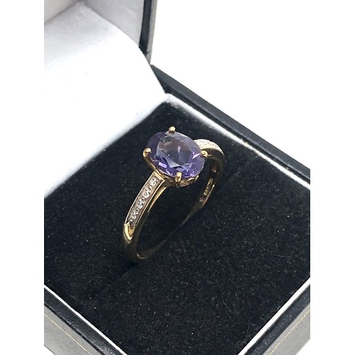 205 - 9ct gold diamond amethyst ring (2.1g)