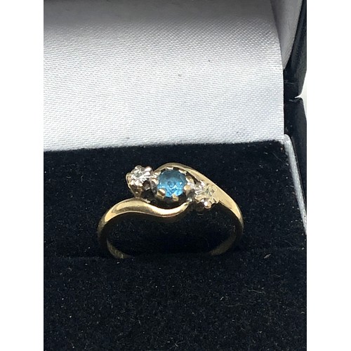 177 - 9ct gold diamond & topaz ring (2.4g)