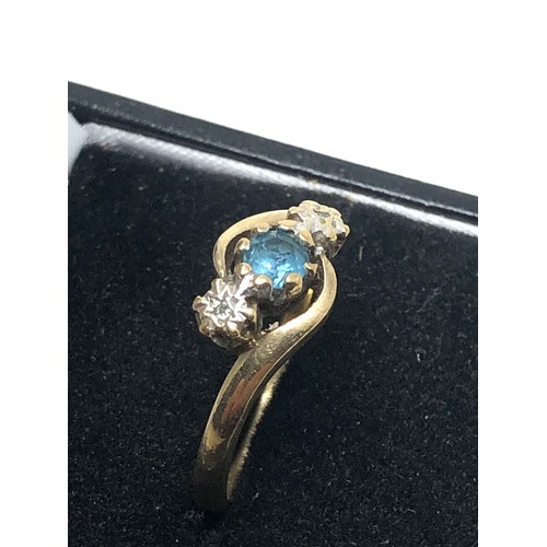 177 - 9ct gold diamond & topaz ring (2.4g)