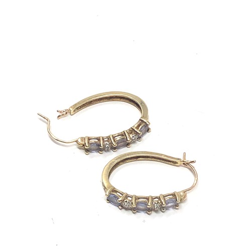 139 - 9ct gold diamond & tanzanite  hoop earrings (3g)