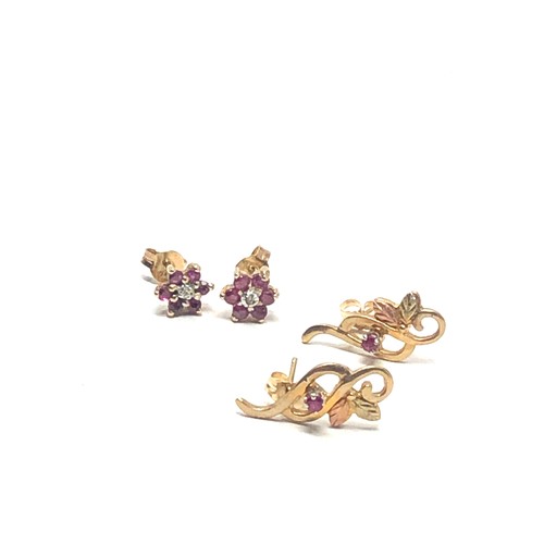 363 - 2 x 9ct gold  ruby earrings inc. diamond (2.8g)