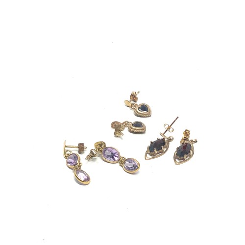 214 - 3 x 9ct gold paired gemstone drop earrings inc. sapphire, amethyst & paste (4.2g)