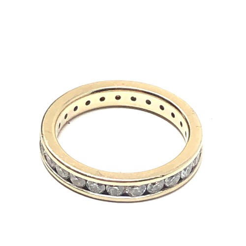 122 - 18ct gold diamond  eternity ring (4.5g)