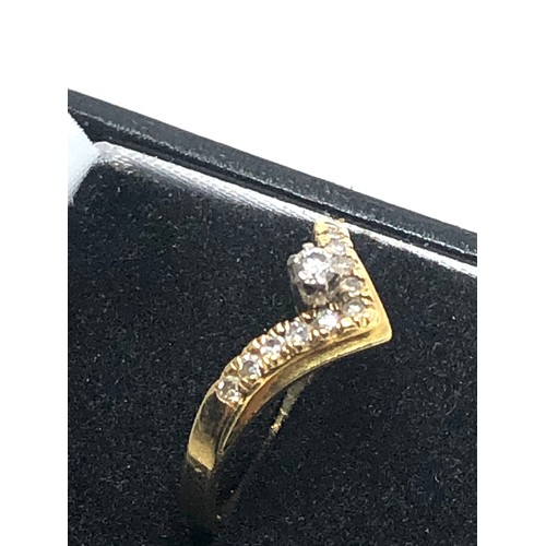 155 - 18ct gold diamond wishbone ring (2.6g)