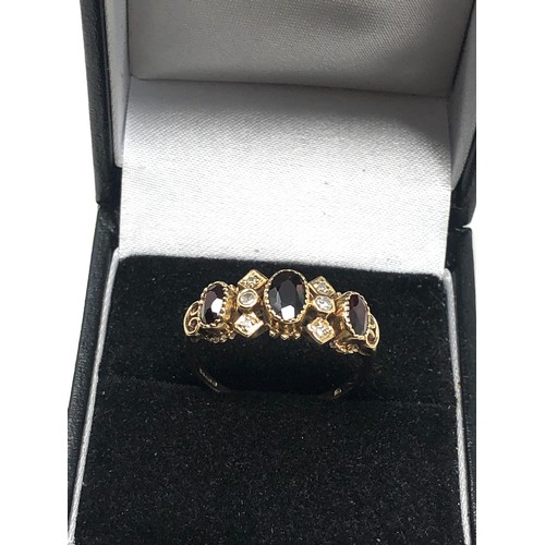 163 - 9ct gold garnet & diamond ring (2.8g)