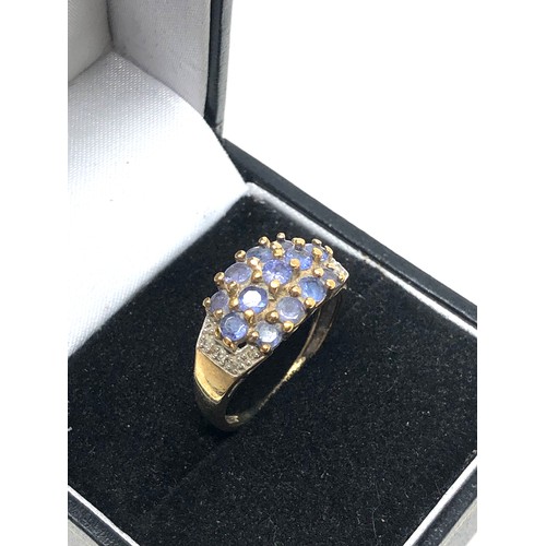 153 - 9ct gold diamond & tanzanite ring (3.4g)