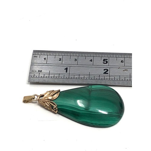 169 - Large 9ct gold foliate topped malachite pendant (23.7g)