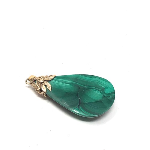 169 - Large 9ct gold foliate topped malachite pendant (23.7g)