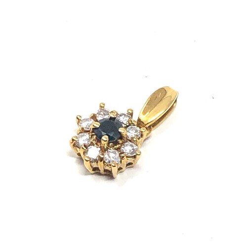 179 - 18ct gold diamond & sapphire floral pendant (1.6g)