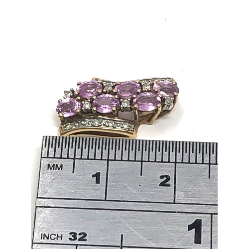 148 - 9ct gold diamond & pink sapphire pendant & chain  2.4g