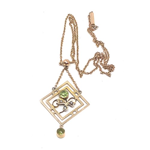 166 - 9ct gold vintage seed pearl & peridot pendant on chain (4g)