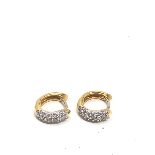 147 - 18ct gold diamond hoop earrings (3.5g)