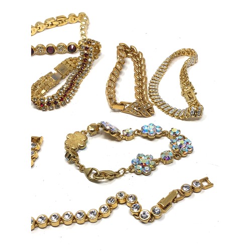 439 - 8 X Gold Tone costume stone set  Bracelets (180g)