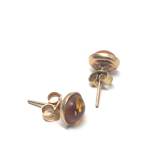 43 - 9ct gold amber earrings  weight 1g
