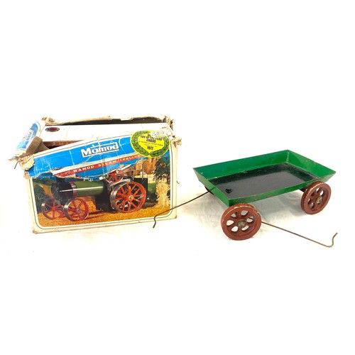 100 - Mamod steam tractor in original box, box is damaged together with trailor