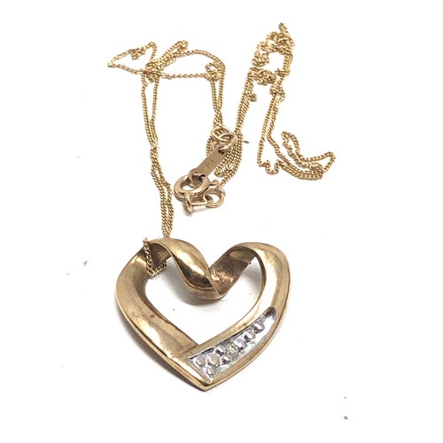 56 - 9ct gold diamond heart pendant necklace weight 2.5g