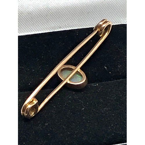 57 - Antique 15ct gold opal brooch set with  central opal that measures approx 13mm by 5.5mm frame xrt te... 