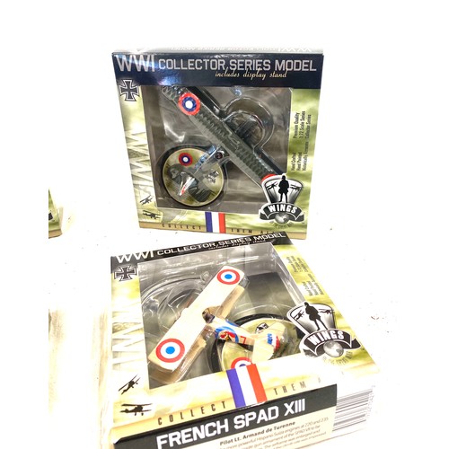 91 - 4 Boxed WW1 die cast aircraft models includes French Spad XIII, American D.H.4 etc