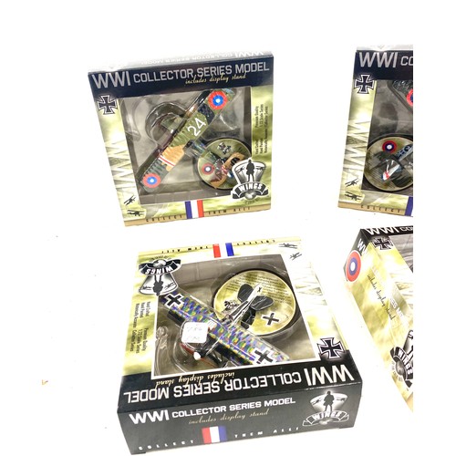 91 - 4 Boxed WW1 die cast aircraft models includes French Spad XIII, American D.H.4 etc