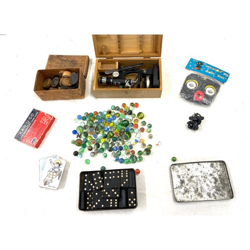 55 - Selection of vintage and later toys includes dominos, Kan u Go, Marbles, Winky dolls etc
