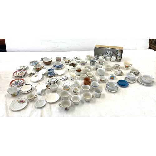 43 - Large selection of assorted miniature cups a saucers