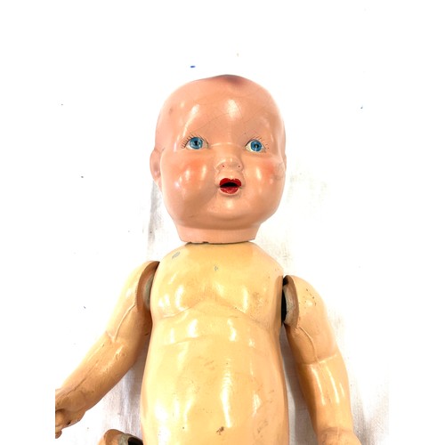 86 - Vintage jointed doll, approximate length 16.5 inches