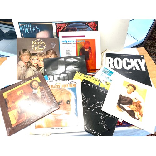 267 - Large selection of LP records to include Rocky, U2, Bucks fizz, The Nolands, Wham, Elvis Costello et... 