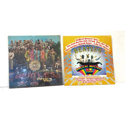 83 - Two Beatles vinyl records to include Magical Mystery Tour and Lonely hearts