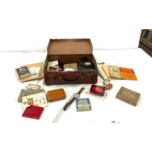 61 - Small breifcase containing a large quantity of collectables