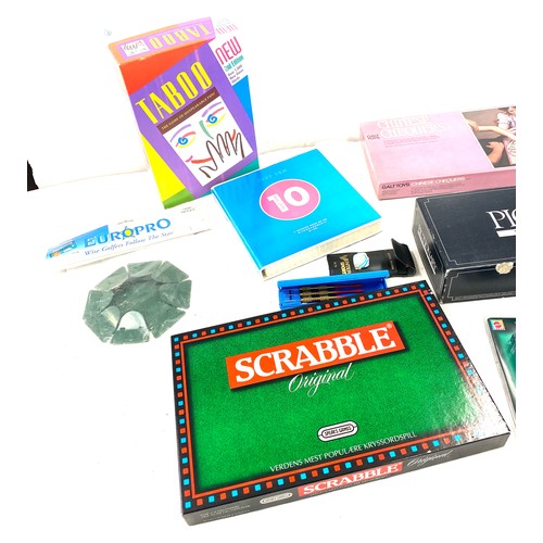 259 - Large selection of assorted games includes Pictonary, just 10, scrabble etc