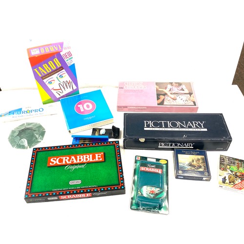 259 - Large selection of assorted games includes Pictonary, just 10, scrabble etc