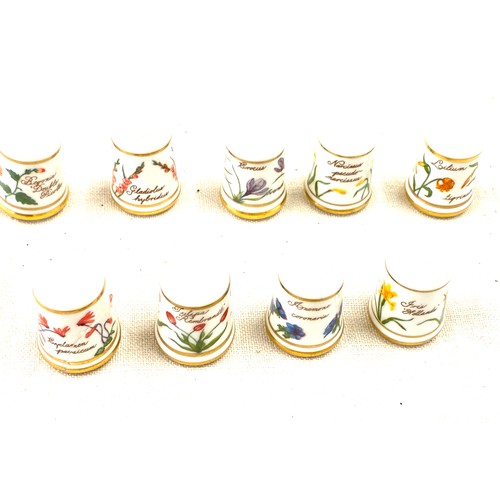 44 - Selection of Franklin Porcelain thimbles and thimble display