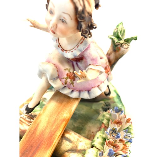 41 - 2, Italian capodimonte figures (girl on seesaw has 2 broken figures) the piece is signed, the boy fi... 