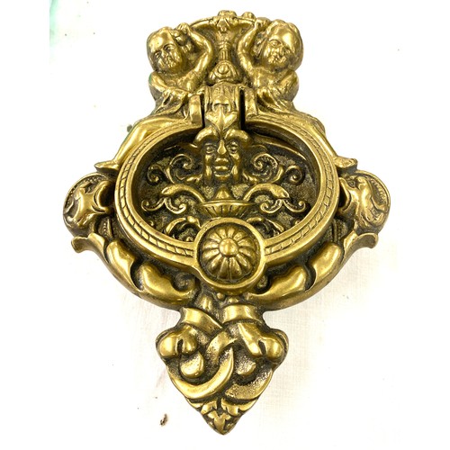 16 - Large brass door knocker measures approx 10.5 inches tall by 7.5 inches width
