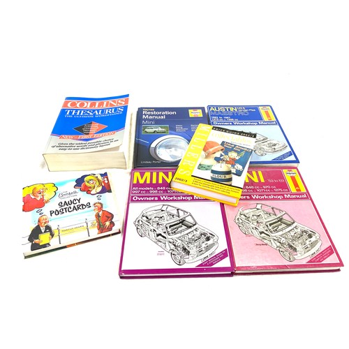 27 - Selection of assorted books includes 4 car manuals, 1 thesaurus, saucy postcards etc
