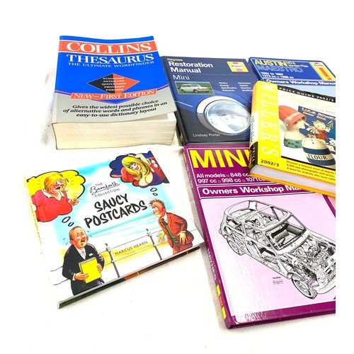 27 - Selection of assorted books includes 4 car manuals, 1 thesaurus, saucy postcards etc