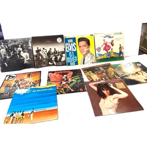 32 - Large selection of records includes Elvis G.I Blues, Real thing 4 from 8, Madness the rise and fall ... 