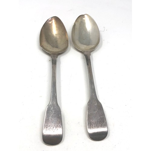 20 - 2 georgian silver serving spoons