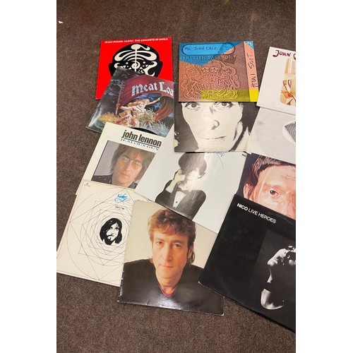 144 - Selection of assorted records includes jean-michel jarre the concerns in china, Meat Loaf, John Lenn... 