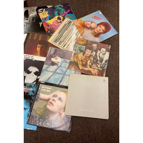 146 - Large selection of assorted records includes Lou Reed Street Hassle, New Sensations, Legendary heart... 