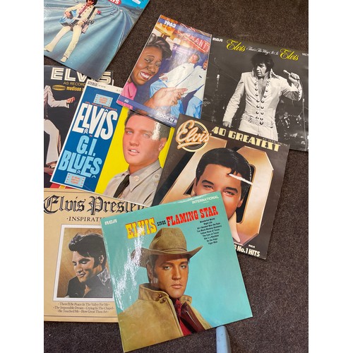 174 - Large selection of Rock/ Elvis Lps includes Queen a night at the opera LP, Burning Love, Sperate way... 