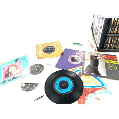 180 - Large selection of 45's to include Dionne and friends, Jennifer Rush, Diana- chain reaction etc