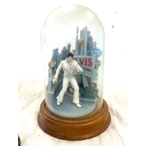 413 - A selection of vintage  Elvis Presley figures in glass domes largest measures approx 10 inches tall