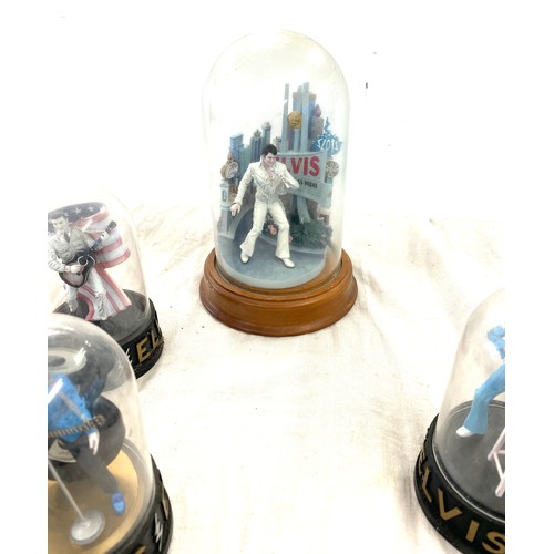 413 - A selection of vintage  Elvis Presley figures in glass domes largest measures approx 10 inches tall