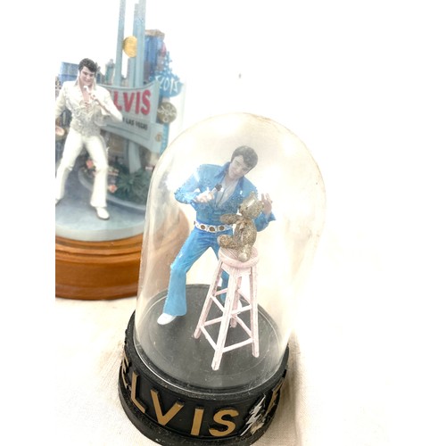 413 - A selection of vintage  Elvis Presley figures in glass domes largest measures approx 10 inches tall