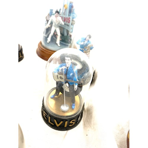 413 - A selection of vintage  Elvis Presley figures in glass domes largest measures approx 10 inches tall