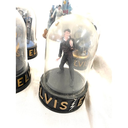 413 - A selection of vintage  Elvis Presley figures in glass domes largest measures approx 10 inches tall