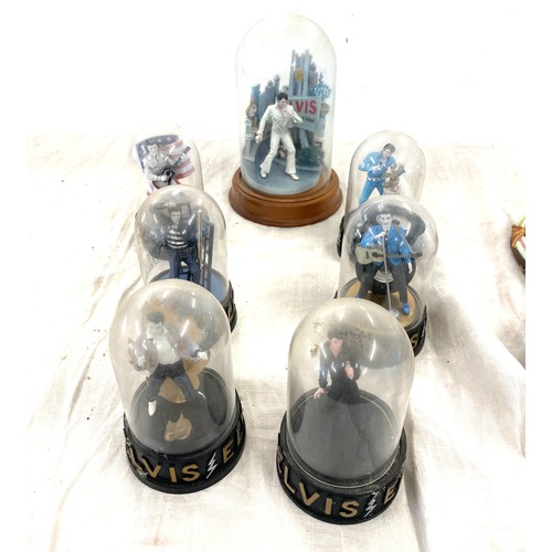 413 - A selection of vintage  Elvis Presley figures in glass domes largest measures approx 10 inches tall